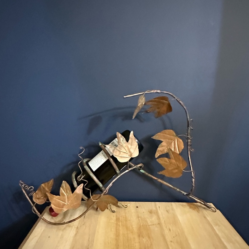 Homemade maple leaf copper wine bottle holder